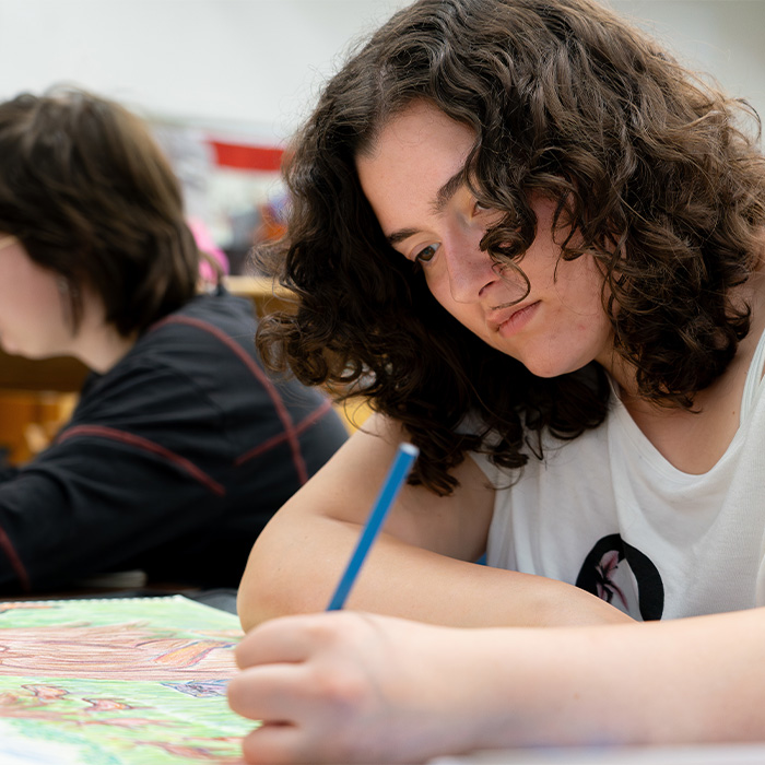 An art student working on a project.